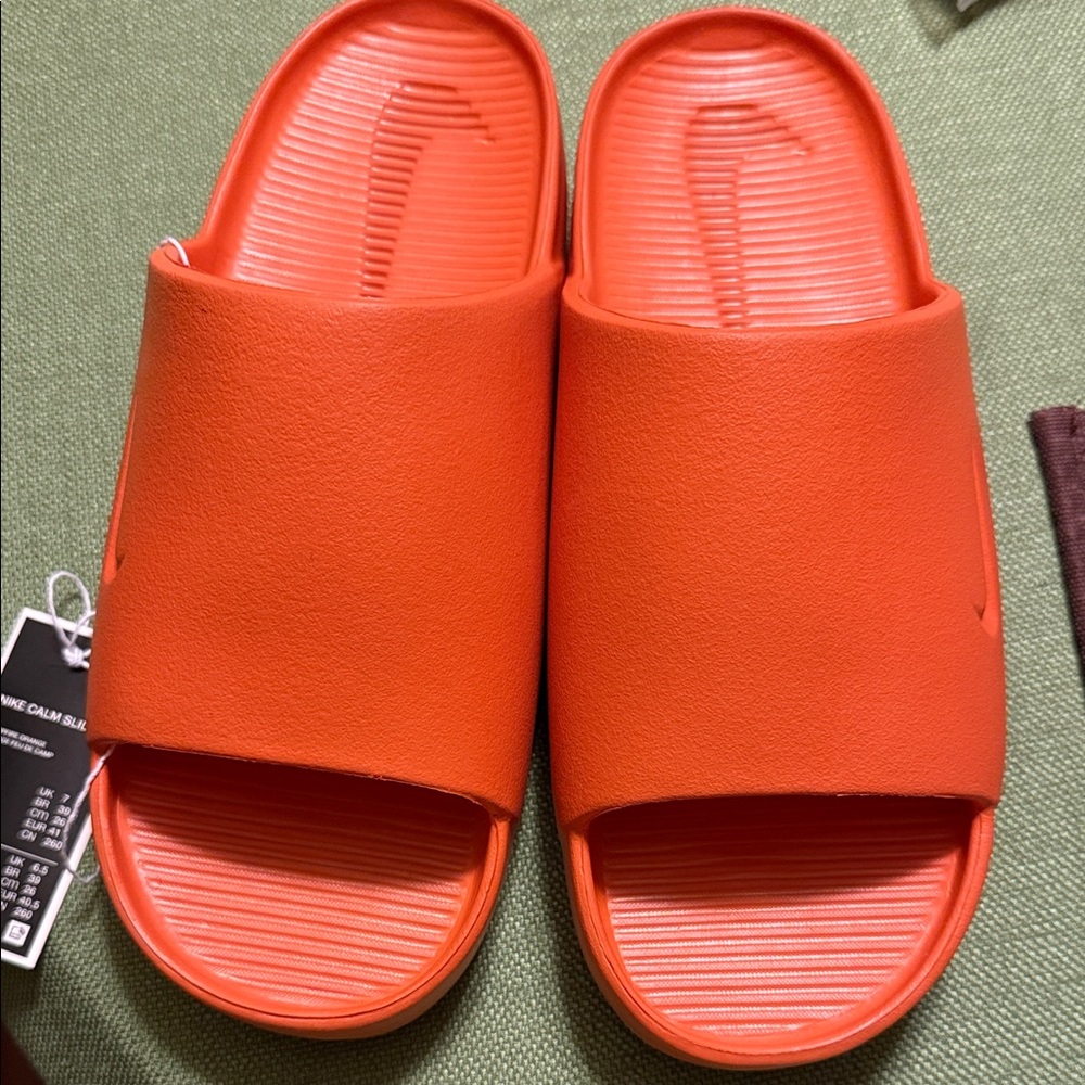 Nike Vibrant Orange Slides